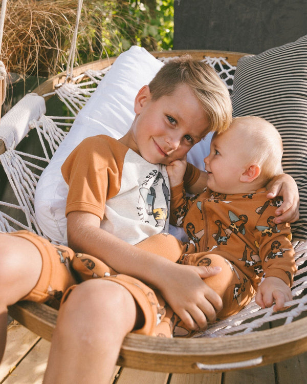 Printed Organic Cotton One-Piece Pajama Sloths On Tan Background Pajamas Deux par Deux