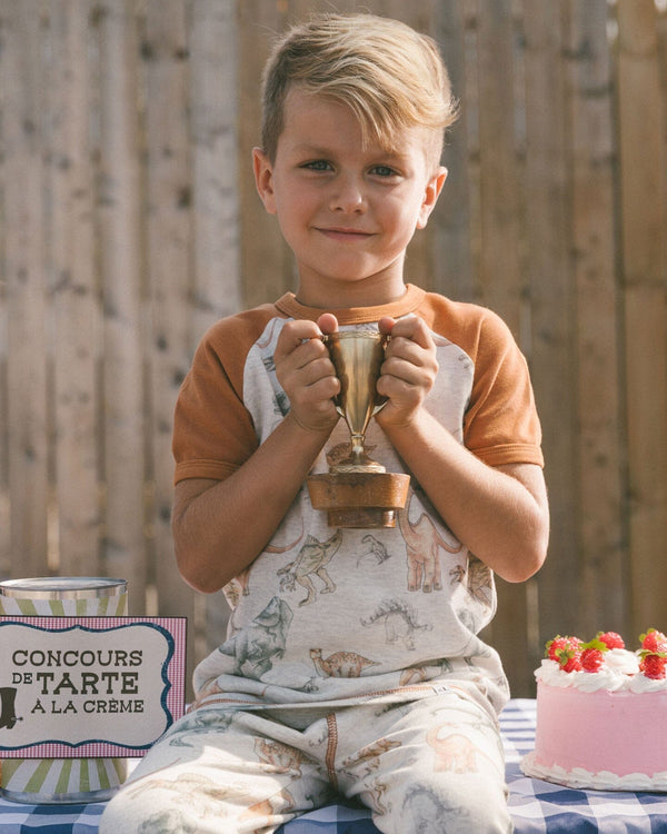 Organic Cotton Two-Piece Short Sleeve Top And Pant Pajama Set Dinosaur On Mottled And Tan Background - G30PB12_046