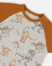 Organic Cotton Two-Piece Short Sleeve Top And Pant Pajama Set Dinosaur On Mottled And Tan Background - G30PB12_046