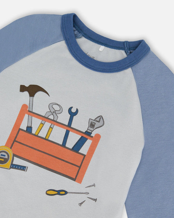 Organic Cotton Long Sleeve Top And Pants Two-Piece Pajama Set Tools On Bluish Gray Background Pajamas Deux par Deux
