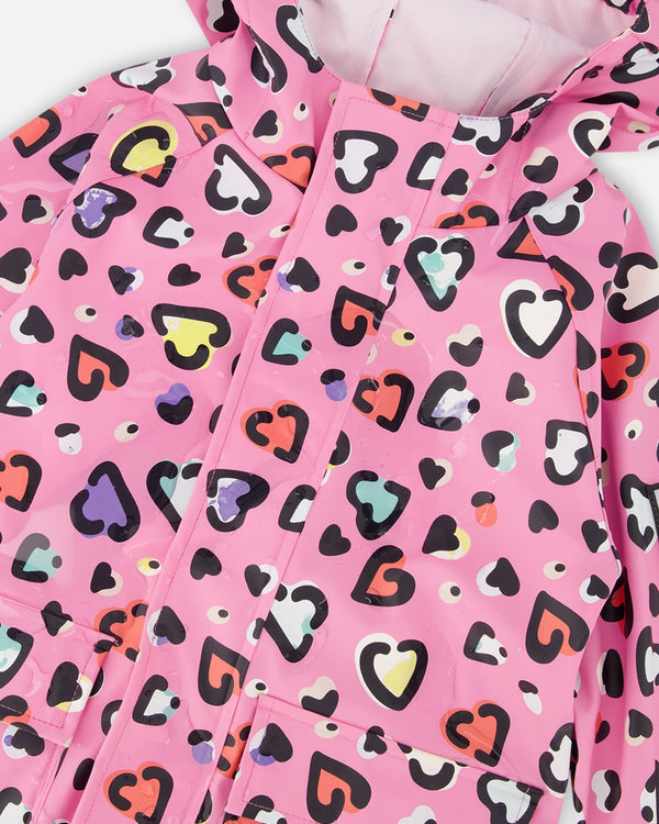 Pink rain jumpsuit with color-changing hearts print Outerwear Deux par Deux