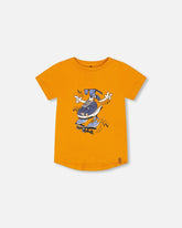 T-shirt orange avec imprimé soulier en coton biologique