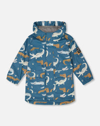 Blue Raincoat With Crocodiles That Change Color Upon Contact With Water