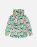 Packable Windbreaker In Polyester Green Smiling Flower Print Outerwear Deux par Deux 