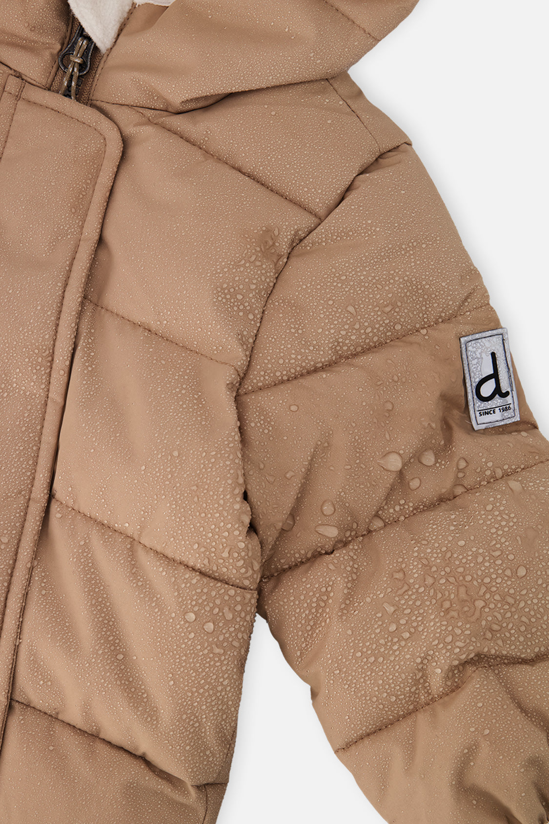 Beige Babyschneeanzug „Baby Cloud“ als Einteiler, für Autositze geeignet