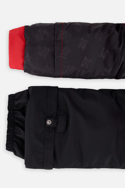 Habit de neige deux pièces PLAY rouge avec pantalon noir