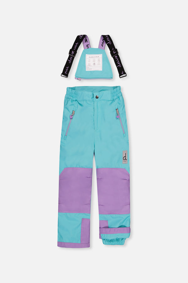 Zweiteiliger Spiel-Schneeanzug in mehreren Farben mit Rautenmuster, türkisfarbener Jacke und violetten Hosen