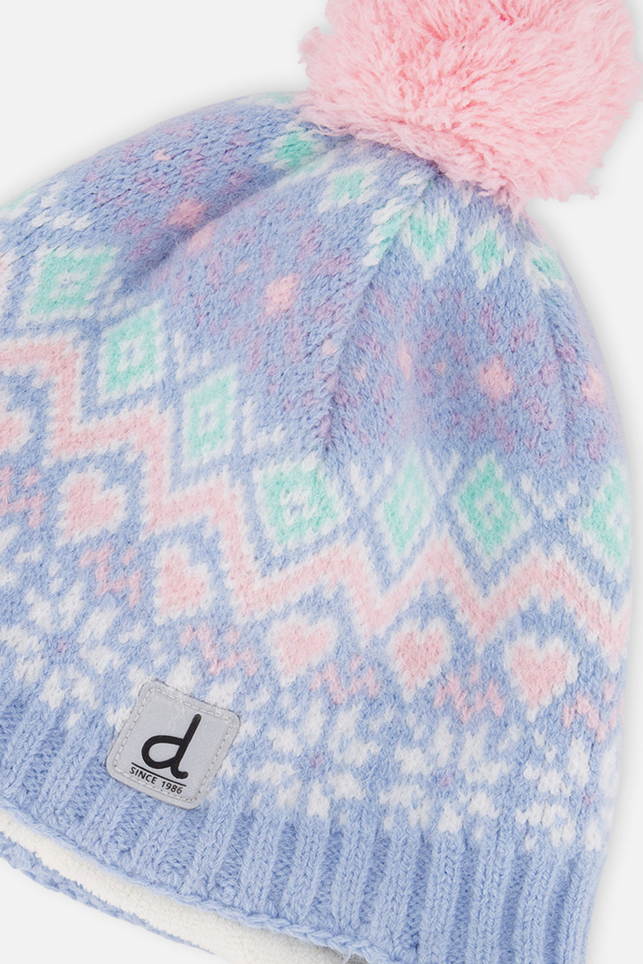 Bonnet d'hiver péruvien en tricot avec pompom bleu clair