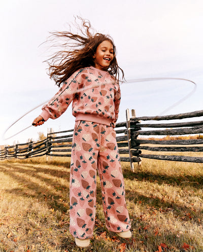 Sweater en molleton rose imprimé fraises