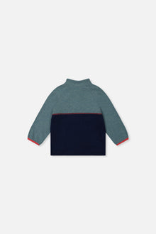 Haut à col montant zippé turquoise pâle pour bébé